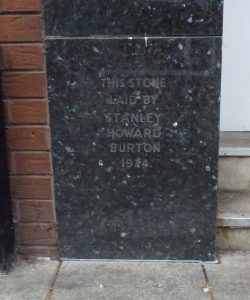 Former Burton store foundation stone, Peterborough, 2025.