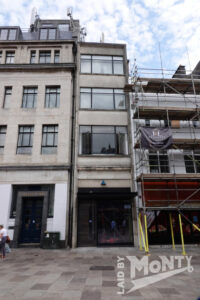 Late 1950s 2 St. John Street side entrance to Burton building at 4-6 Queen Street, Cardiff, 2026
